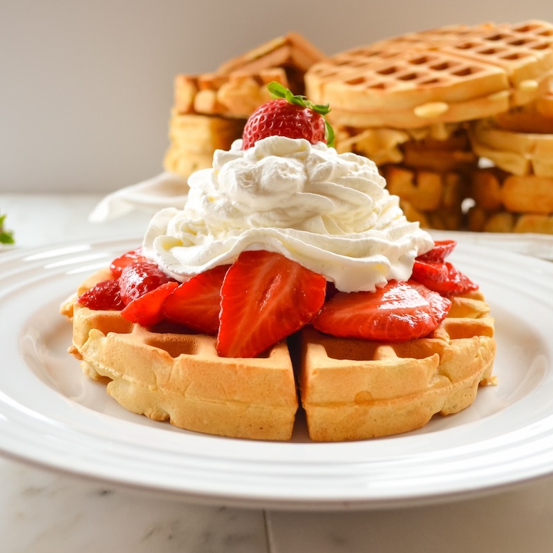 Whole Grain Waffles with Strawberries and Whipped Cream